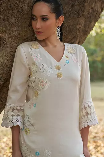 white floral embroidered regular thread work  cotton kurta with trousers