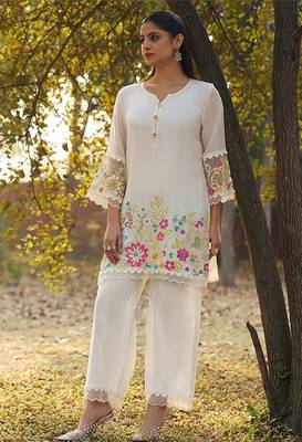 cream embroidered  cotton round neck kurti & trousers 2