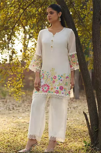 cream embroidered  cotton round neck kurti & trousers