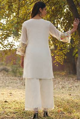 cream embroidered  cotton round neck kurti & trousers 3