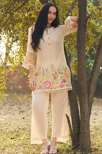 peach embroidered  cotton round neck kurti & trousers