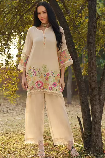 peach embroidered  cotton round neck kurti & trousers