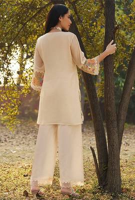 peach embroidered  cotton round neck kurti & trousers 3