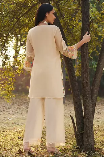 peach embroidered  cotton round neck kurti & trousers