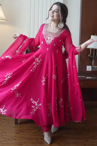 Red faux georgette embroidered flared gown set