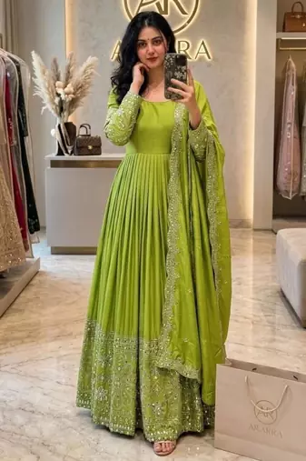 Green silk blend embroidered flared gown set