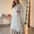 White georgette embroidered flared gown set