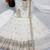 White georgette embroidered flared gown set