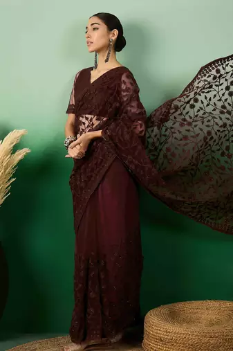 Burgundy embroidered work net saree with floral design