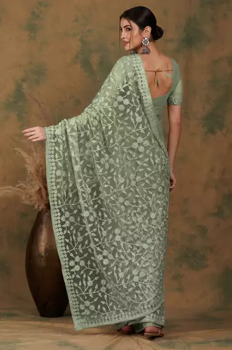 Light olive embroidered work net saree with floral design