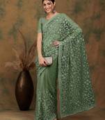 Olive embroidered work net saree with floral design
