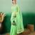 Pastel green work net saree with floral design