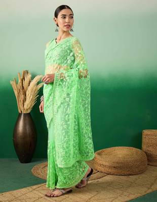Pastel green work net saree with floral design 3