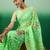 Pastel green work net saree with floral design