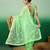 Pastel green work net saree with floral design