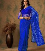 Royal blue work net saree with floral design