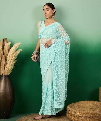 Sky blue work net saree with floral design 1
