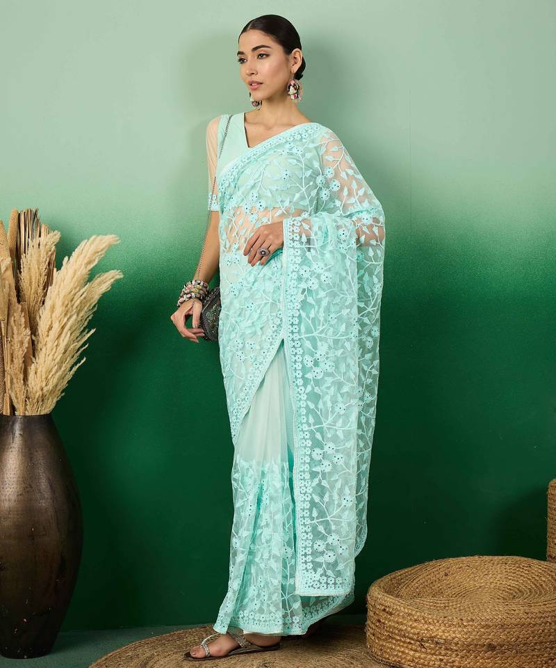 Sky blue work net saree with floral design