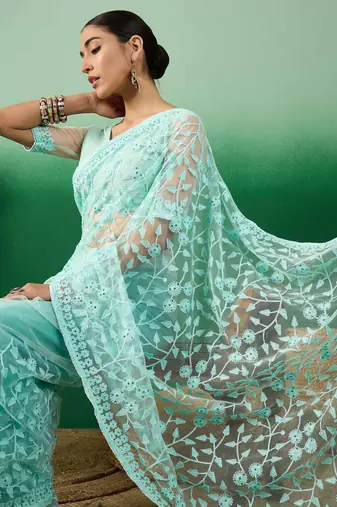 Sky blue work net saree with floral design