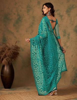 Teal blue work net saree with floral design 4