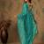 Teal blue work net saree with floral design