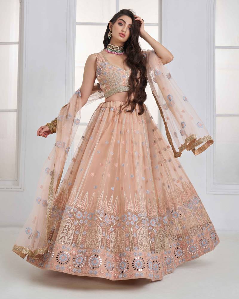 Peach Net sequin embroidered lehenga set with choli and Dupatta