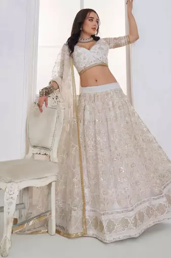 Off White Net sequin embroidered lehenga set with choli and Dupatta