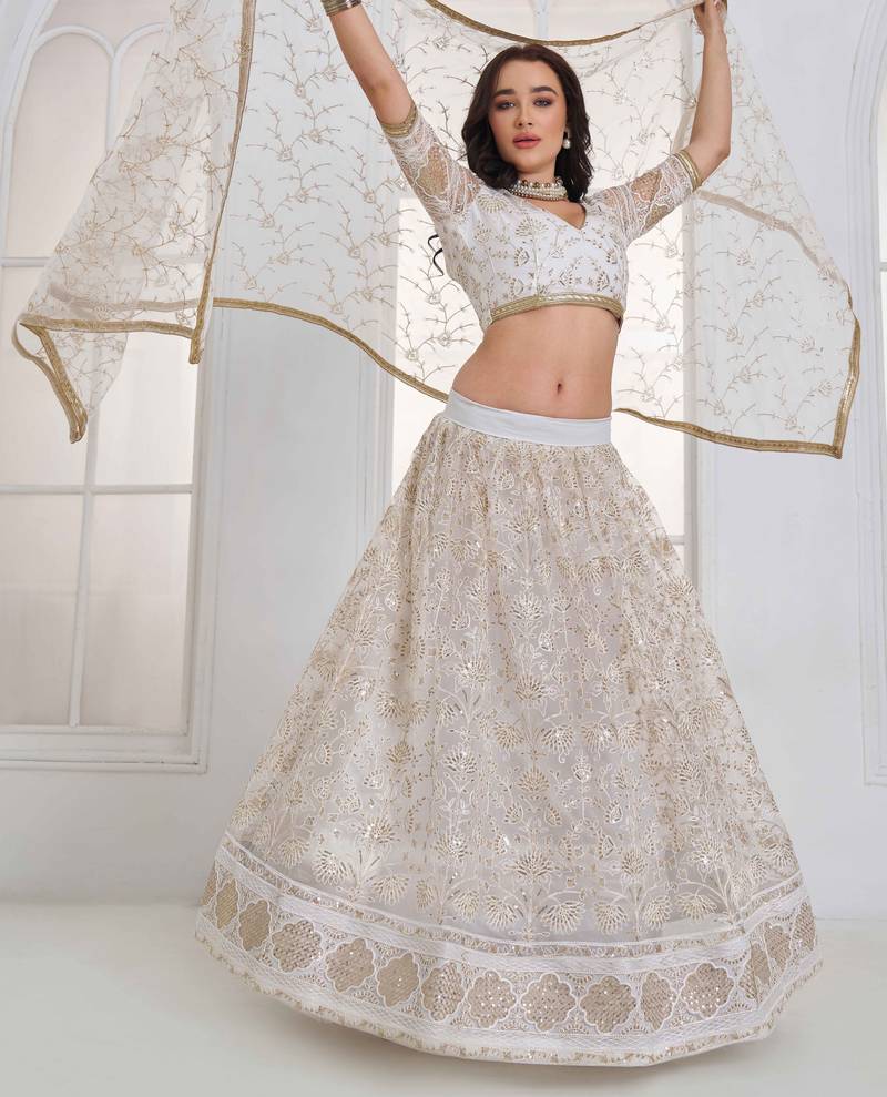 Off White Net sequin embroidered lehenga set with choli and Dupatta