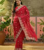 Red bandhani printed saree with embroidered border