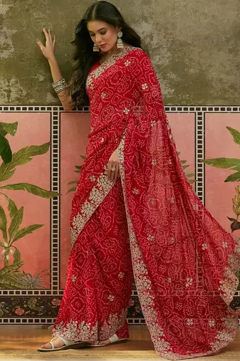 Red bandhani printed saree with embroidered border