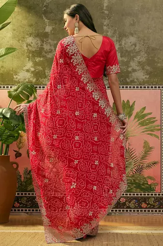 Red bandhani printed saree with embroidered border