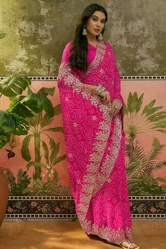 Pink bandhani printed saree with embroidered border