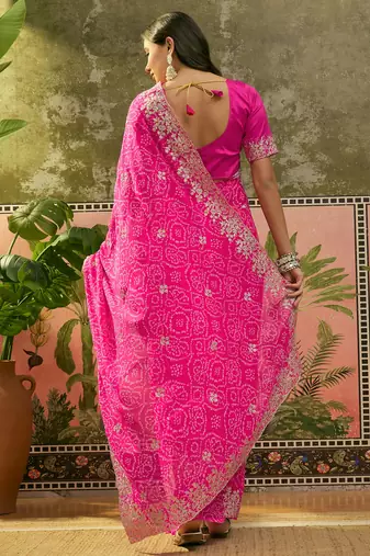 Pink bandhani printed saree with embroidered border