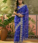 Blue bandhani printed saree with embroidered border