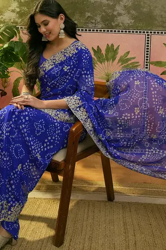 Blue bandhani printed saree with embroidered border
