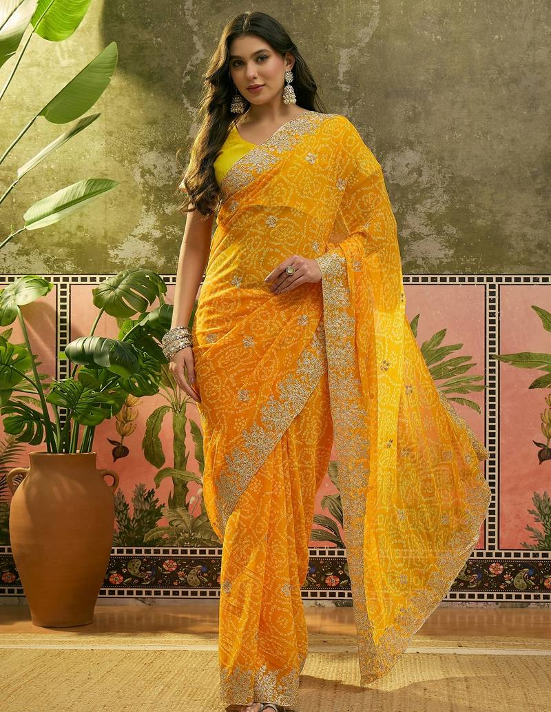Yellow bandhani printed saree with embroidered border