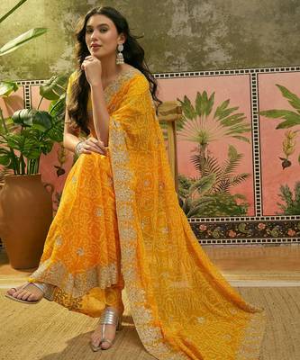 Yellow bandhani printed saree with embroidered border 2