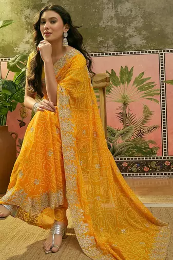Yellow bandhani printed saree with embroidered border