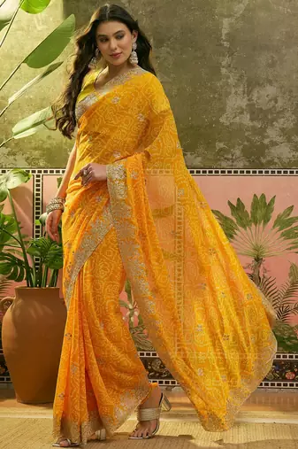 Yellow bandhani printed saree with embroidered border