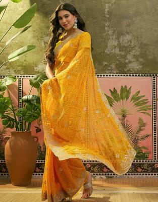 Yellow bandhani printed saree with embroidered border 4