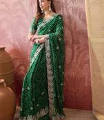 Green bandhani printed saree with embroidered border