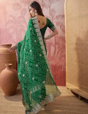 Green bandhani printed saree with embroidered border 5