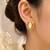 Baroque pearl stud earrings with gold wire wrap design