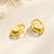Baroque pearl stud earrings with gold wire wrap design