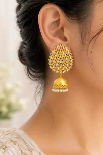 Gold-toned kundan jhumka earrings with pearl drops