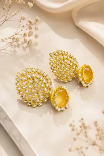 Gold-toned kundan jhumka earrings with pearl drops