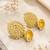 Gold-toned kundan jhumka earrings with pearl drops