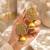 Gold-toned kundan jhumka earrings with pearl drops