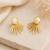 Baroque pearl sunburst stud earrings in gold-tone