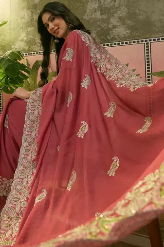 peach embroidered saree with paisley motifs